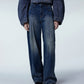 Deconstructed Relaxed-fit Washed Jeans